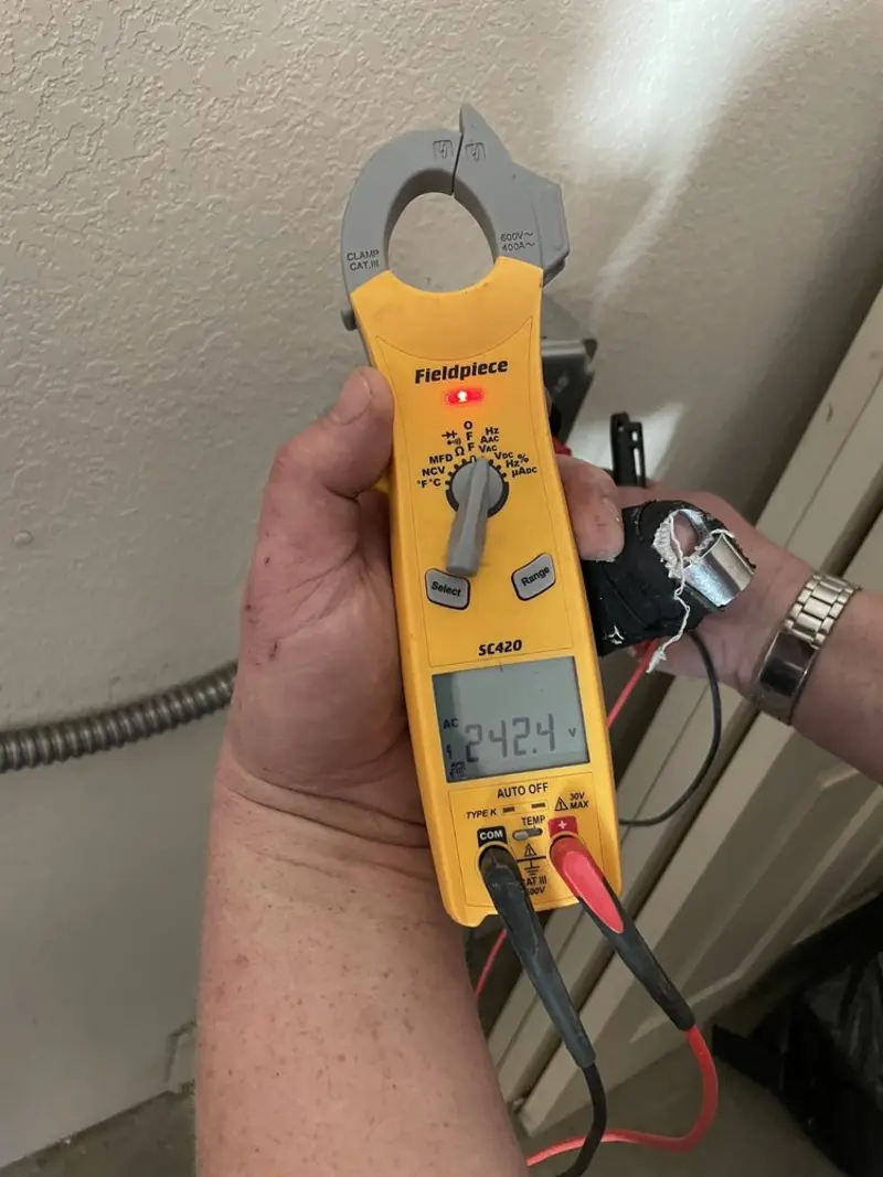 Voltage testing with clamp meter during Generator Installation in Windsor